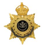 Badge. The Welsh Regiment Officer’s helmet plate circa 1902-14. Splendid rich gilt example.