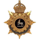 Badge. Royal Warwickshire Regiment Officer’s helmet plate circa 1902-14. A fine gilt example by