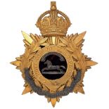 Badge. POW West Yorkshire Regiment Officer’s helmet plate circa 1901-04. A very fine gilt example.