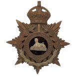 Badge. East Lancashire Regiment Officer’s helmet plate circa 1901-14. A gilt example. Crowned star