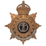 Badge. DCO Middlesex Regiment Officer’s helmet plate circa 1901-14. A good gilt example. Crowned