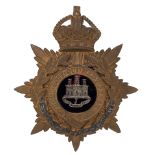 Badge. Suffolk Regiment Officer’s helmet plate circa 1900-01. A good gilt example. Crowned star