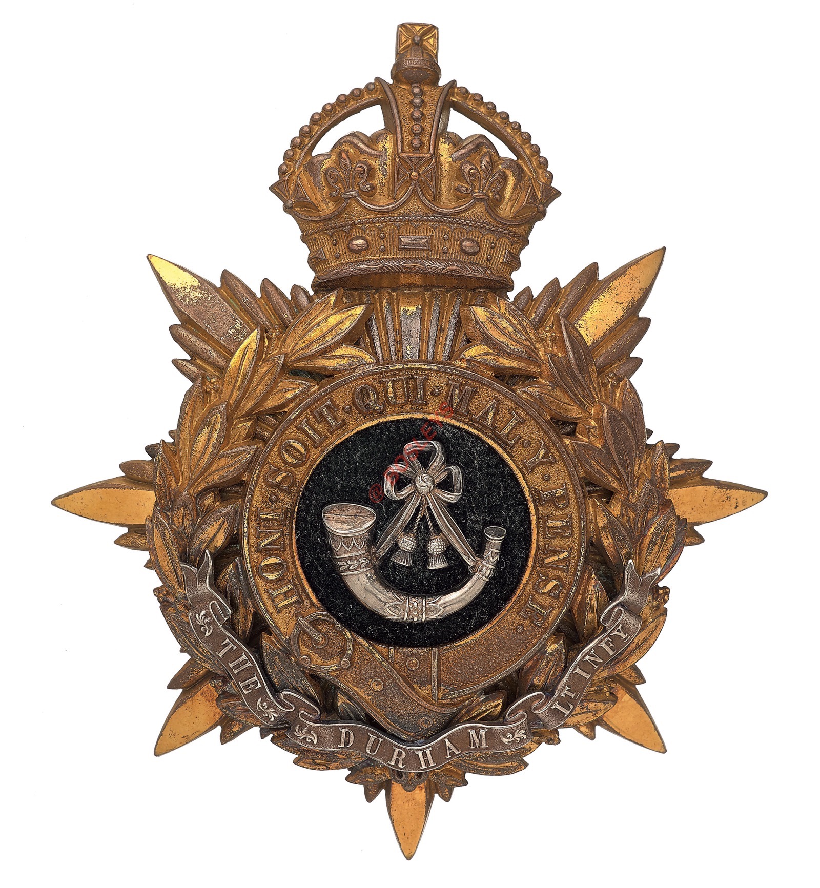 Badge. The Durham Light Infantry Officer’s helmet plate circa 1902-14. A gilt example. Crowned