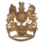 Badge. Royal Artillery OR’s helmet plate circa 1902-14. A good die-stamped brass example. Royal Arms