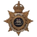 Badge. The Buffs, East Kent Regiment Officer’s helmet plate circa 1901-14. A good gilt example.