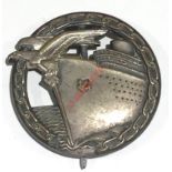 German Third Reich WW2 Kriegsmarine Blockade Runners War badge. A good die-cast example. Circular