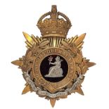 Badge. Norfolk Regiment Officer’s helmet plate circa 1901-14. A good scarce gilt example by J &