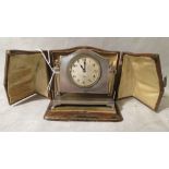 A silver cased eight day dressing table clock in original case, hallmarked for Broadway & Co,