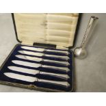 A cased set of six silver handled butter knives and a retro Deakin and Francis silver bud vase,