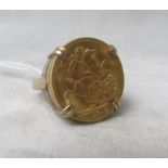 A 9ct yellow gold sovereign ring, the George V Sovereign dated 1913