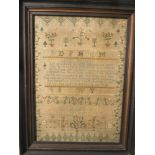 A Georgian alphabet and verse sampler worked by Anny Golby in 1816, mounted in an ebonized frame, 17