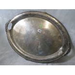 A large oval silver serving tray having a moulded edge and carry handles, Walker and Hall, Sheffield