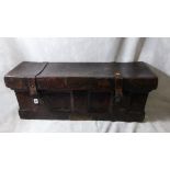 An 18th century leather French coaching box having metal fittings and linen dining lining