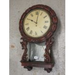 Victorian carved mahogany cased wall hanging dial clock, with glazed pendulum aperture, fusee