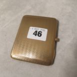 An art deco 9ct gold engine turned cigarette case, 83.4 grams