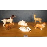 Group of Beswick animal figurines to include a swan, collie dog, and others