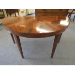 A 19th century mahogany demi-lune console table on square tapering legs