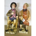 Pair of early 19th century pottery figures of gentlemen seated in a chair holding a pint of beer