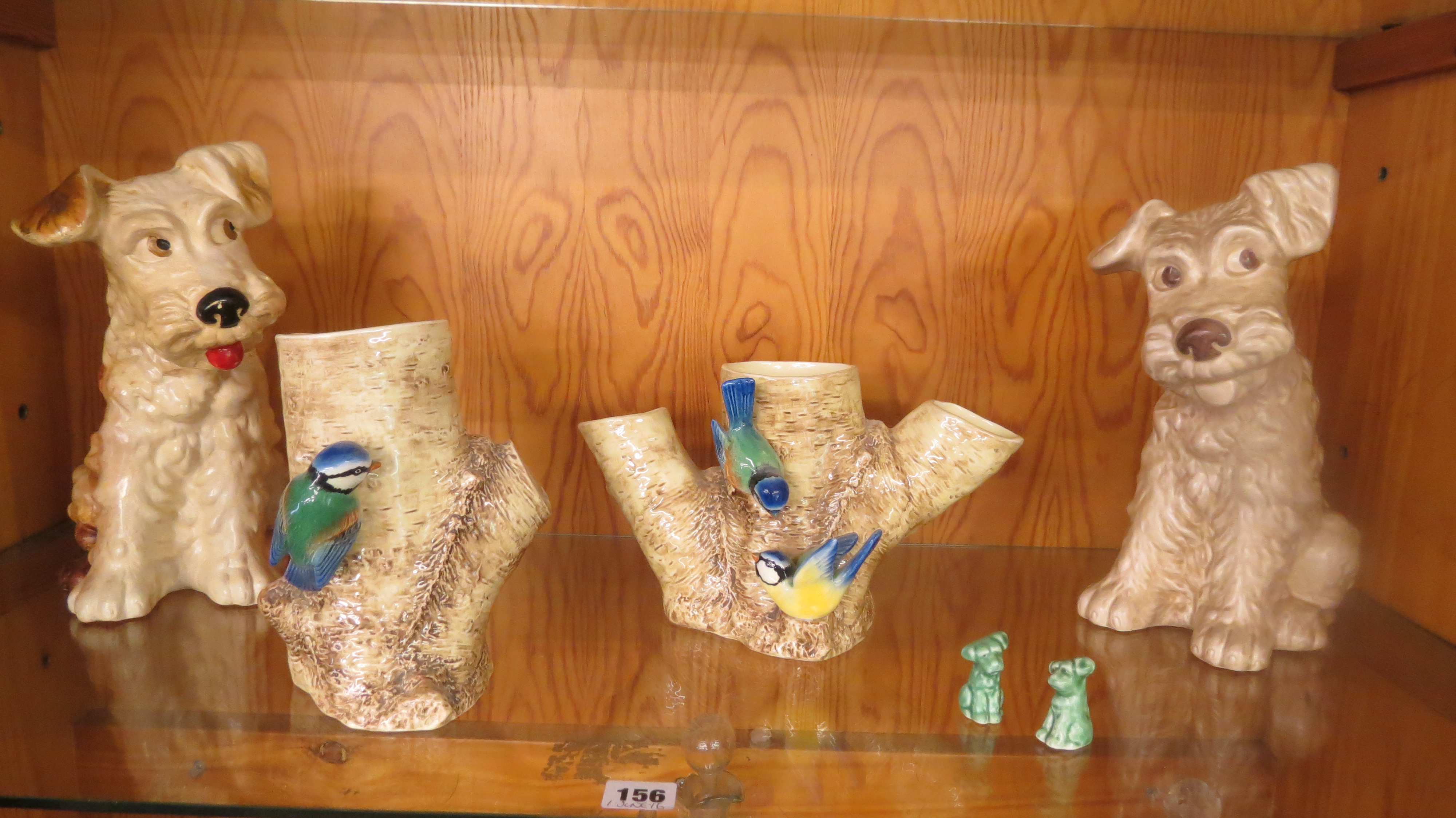 A group of Sylvac animals and bird and tree trunk vases to include a large terrier dog, model no.