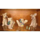 A group of Sylvac animals and bird and tree trunk vases to include a large terrier dog, model no.