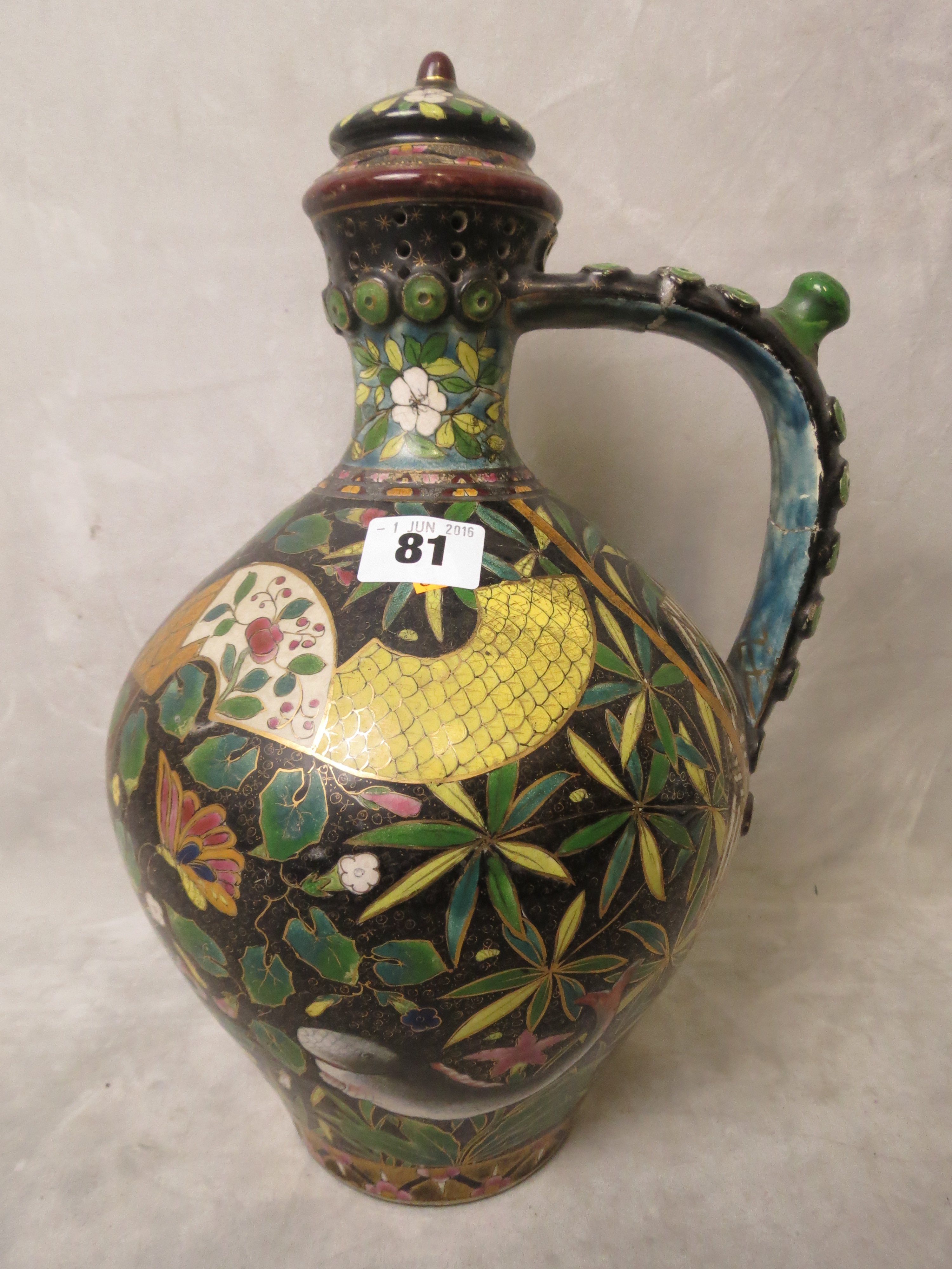 Late 19th century Hungarian pottery ornamental jug decorated with whales, birds and insects in an