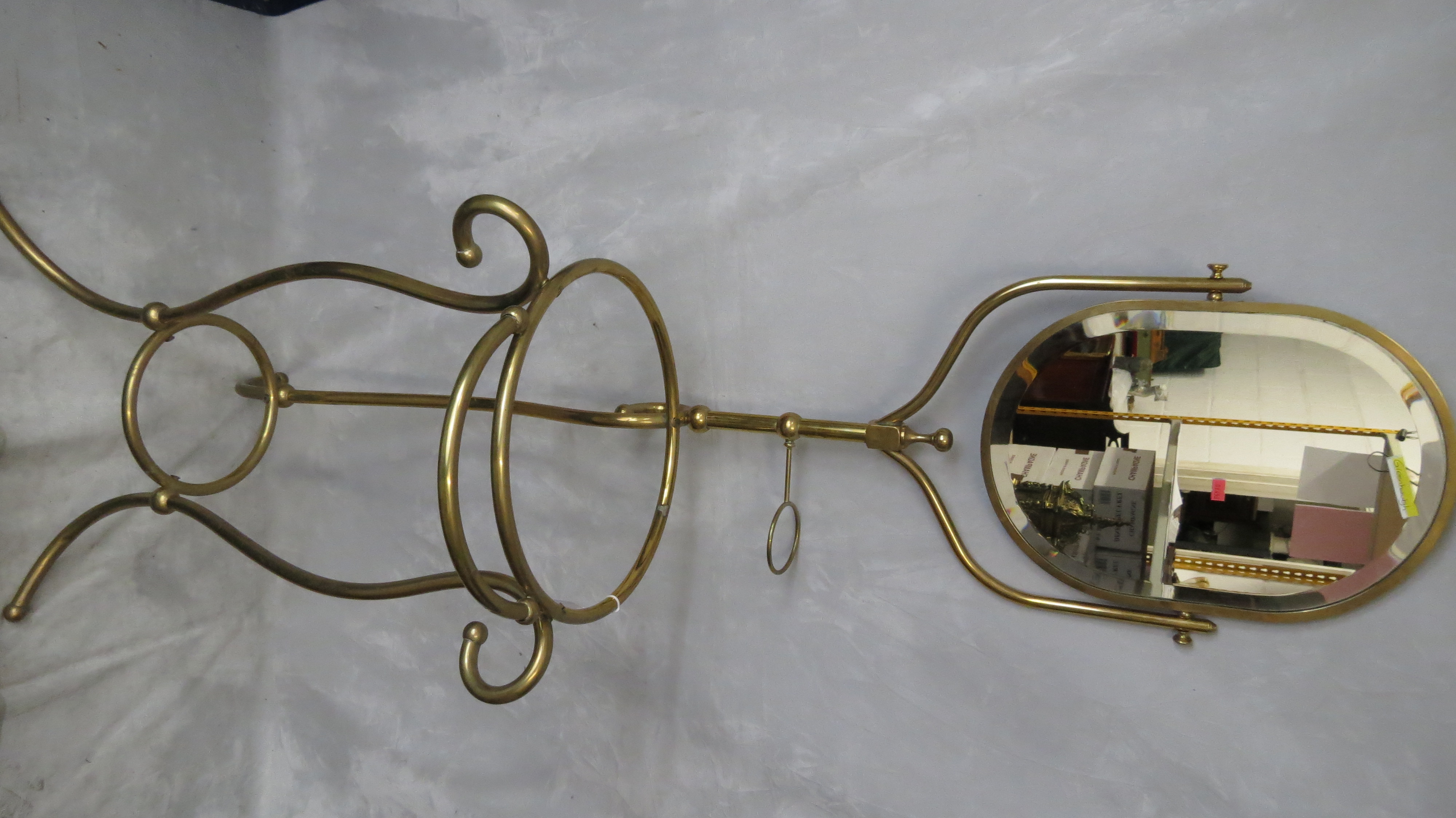 A French brass wash stand with oval swing mirror, 60 1/2 high