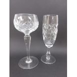 Twelve cut glass Hock Glasses with star cutting and twelve Champagne Flutes with diamond cutting