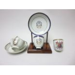 Three Chinese Armorial Cups, four Tea Bowls and four Saucers, some A/F, a crinoline Figure, five