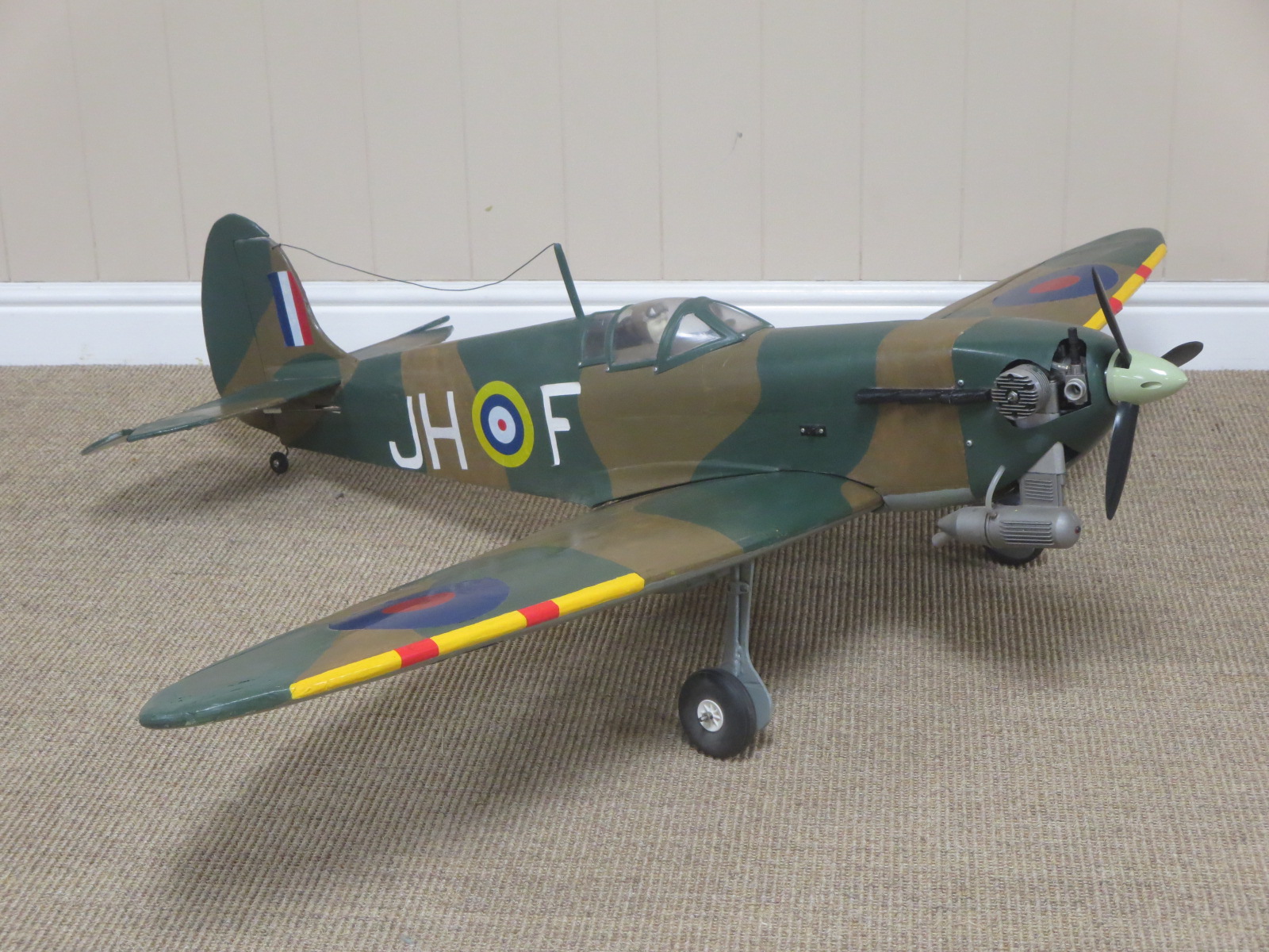 A radio controlled Model of Spitfire with petrol engine and servos, 4ft 8in wingspan