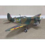 A radio controlled Model of Spitfire with petrol engine and servos, 4ft 8in wingspan