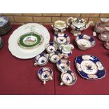 A Gaudy Welsh lustre Tea Service for twelve persons with bright floral design, and a large oval Meat