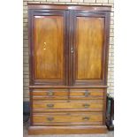 A late 19th Century walnut Linen Press with gouge moulded liner decoration, locks stamped Hobbs