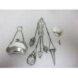 A Victorian silver Chatelaine with embossed scent bottle, button hook, scissors, thimble case,
