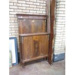 A pair of mahogany Single Beds with panelled headboards having gilt metal mounts and with shaped