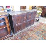 An antique oak Cupboard having 18th Century doors with lozenge inlay designs, 5ft 2in W x 3ft 1in W