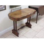 A Victorian Card Table with shaped oblong burr walnut fold-over top on twin turned and fluted