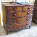 A Victorian mahogany bow front Chest of two short and three long drawers on splay feet, 3ft 7in