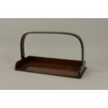 A Regency mahogany Book Trough, rectangular with shaped carrying handle, 15in W