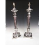 A pair of plated Table Lamps with reeded columns on square bases, 24in