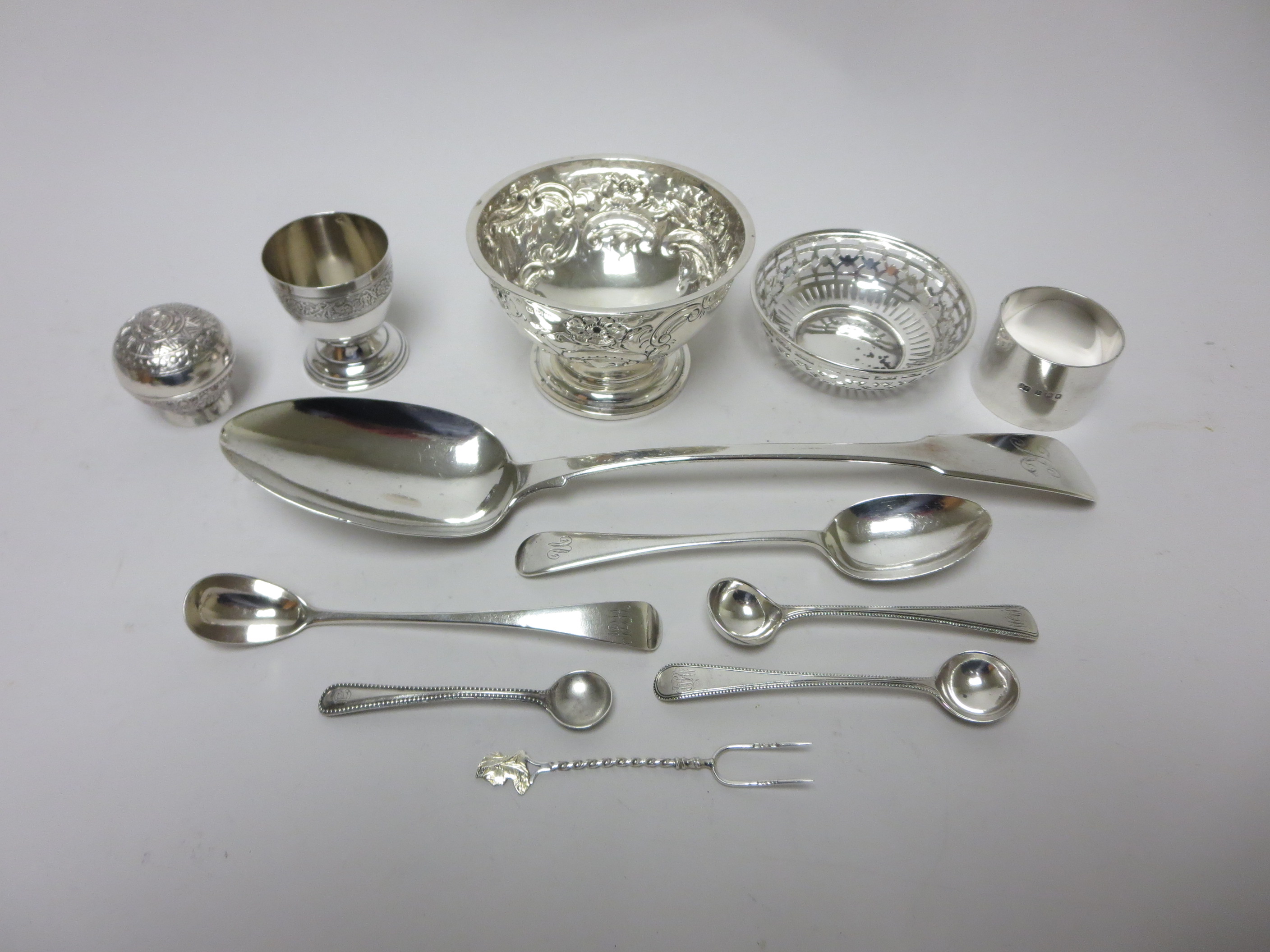 A George III silver Gravy Spoon fiddle pattern, London 1815, four Condiment Spoons, Teaspoon, two