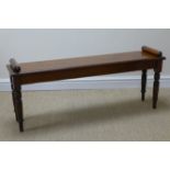 A 19th Century mahogany Hall Bench with moulded top on turned supports, 4ft W