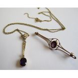 An Edwardian Amethyst and Seed Pearl Necklace millegrain-set oval-cut amethyst suspended below