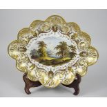 A 19th Century Derby oval lobed Dish painted fisherman by a lake in scrolled gilt border titled '