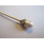 A Pearl and Diamond Stick Pin set single untested pearl in cupola mount pavé-set brilliant-cut