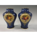 A pair of Royal Worcester baluster Vases, painted panels of fruit with decorative borders, signed