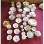 A large collection of Dresden floral painted Cups and Saucers, including an Ecuelle, Cover and Stand