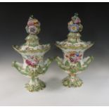 A pair of English porcelain Vases and Covers, the lid with floral encrusted finial, with two handled
