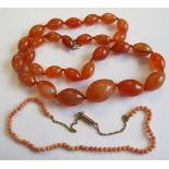 A coral bead Necklace and a graduated Agate Bead Necklace