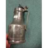 A pewter Flagon with hinged cover, 10 1/2in H, a pewter quart Measure with spout and handle, 6in