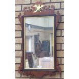 A Georgian style upright Wall Mirror with gilt slip, gilt ho-ho bird surmount and shaped surround,